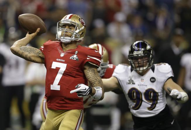 San Francisco 49ers quarterback Colin Kaepernick throws a pass during the second half of Super Bowl XLVII against the Baltimore Ravens on Sunday, Feb. 3, 2013, in New Orleans. 